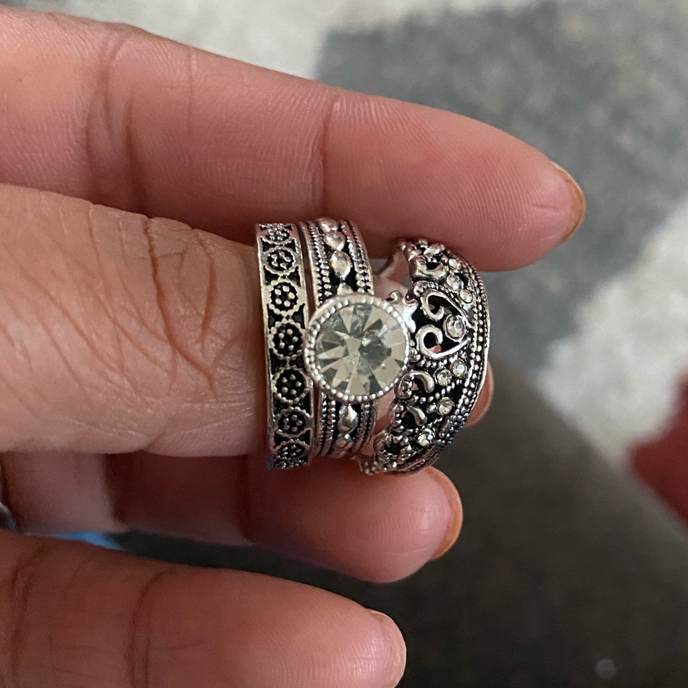 Three silver rings
